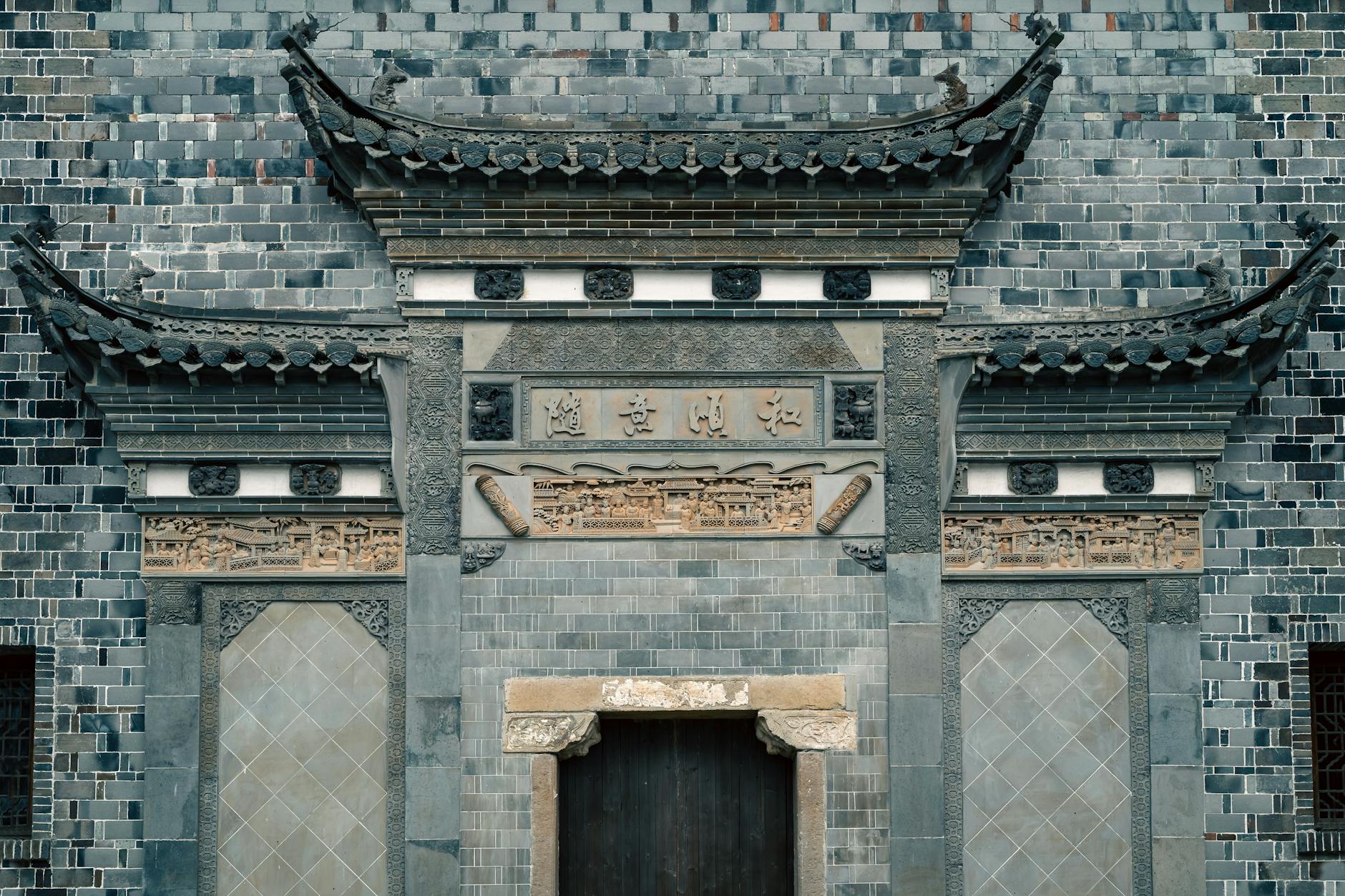 Traditional Chinese architectural gate with intricate carvings in Nanjing.